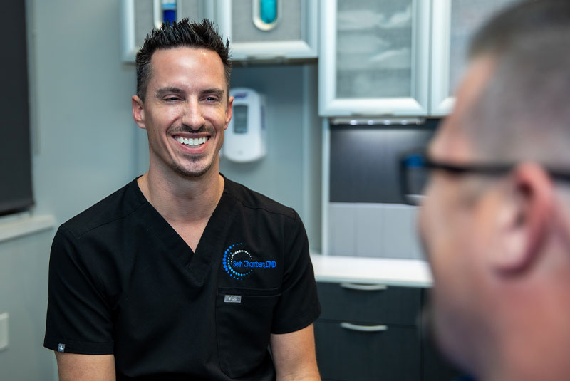Dr. chambers with dental patient.